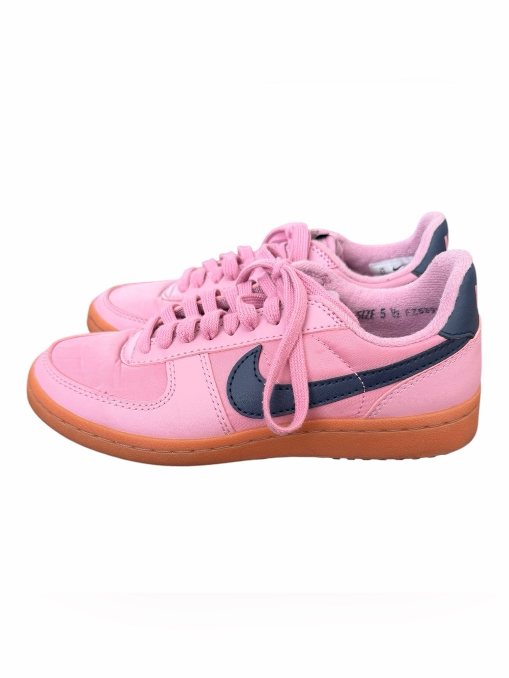 Nike Pink Low-Top Sneakers with Navy Swoosh and Gum Sole